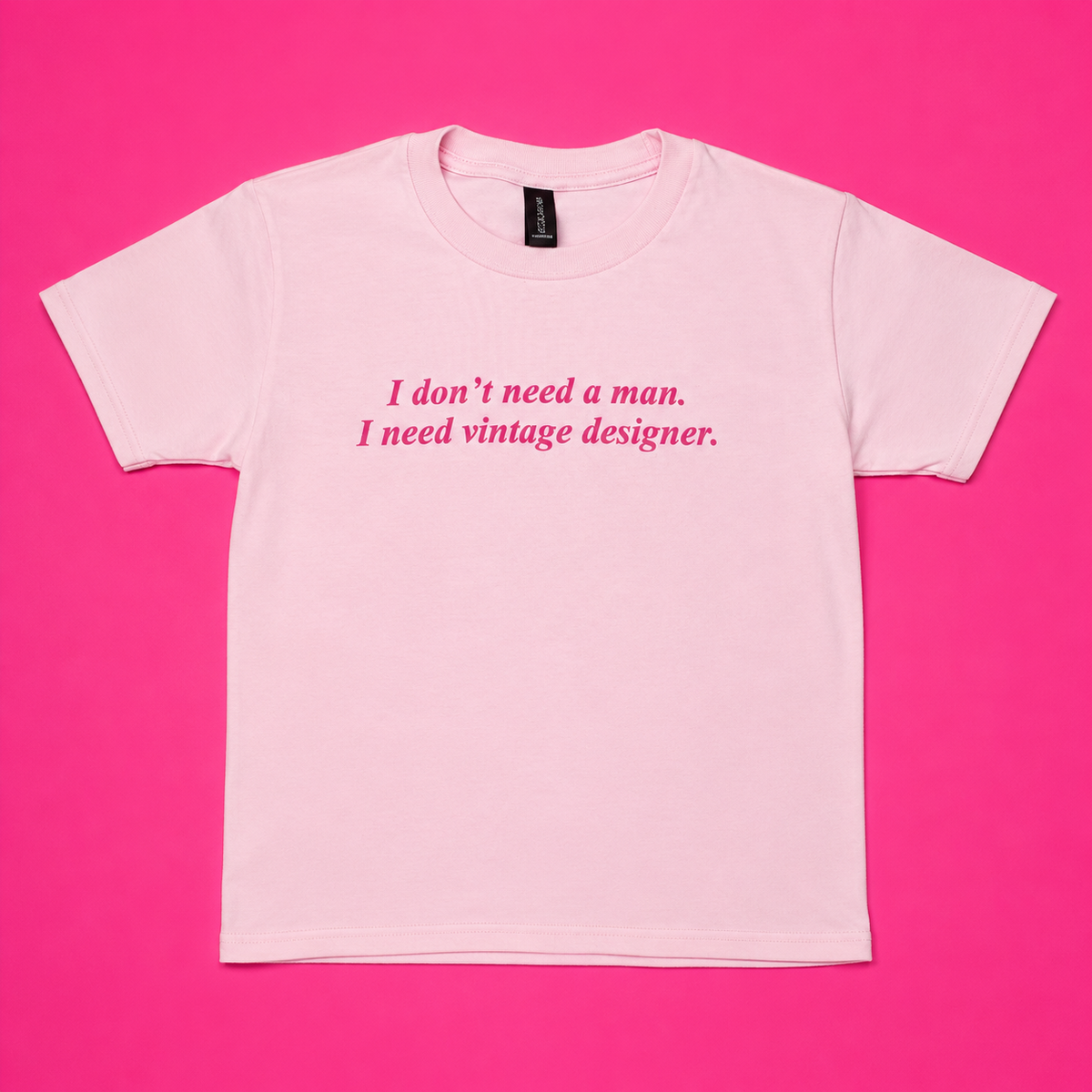 "I Don't Need A Man I Need Vintage Designer" Baby Tee