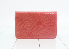 Chanel Pink Camellia Wallet on Chain in Embossed Patent Leather