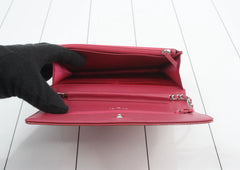 Chanel Pink Camellia Wallet on Chain in Embossed Patent Leather