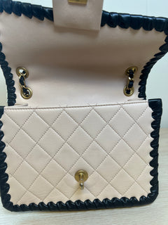 CHANEL Light Pink Lambskin & Black Whipstitch