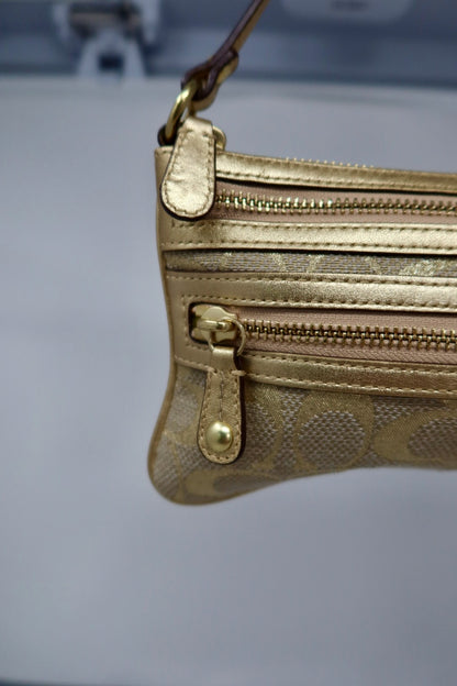 Coach Gold pochette