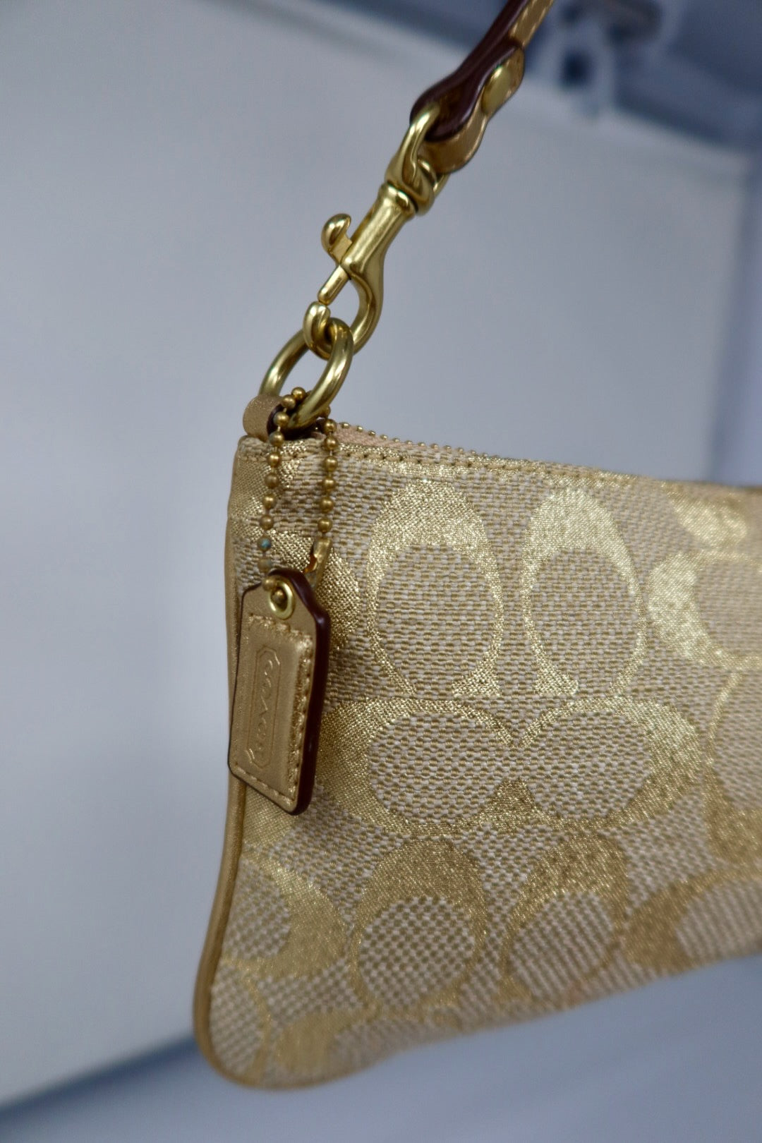 Coach Gold pochette