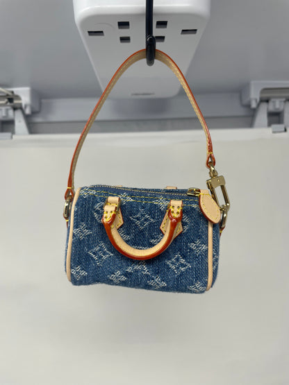 Louis Vuitton x TM Cherry Micro Speedy Bag Charm with Strap, original box, and duster