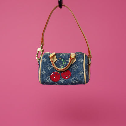 Louis Vuitton x TM Cherry Micro Speedy Bag Charm with Strap, original box, and duster