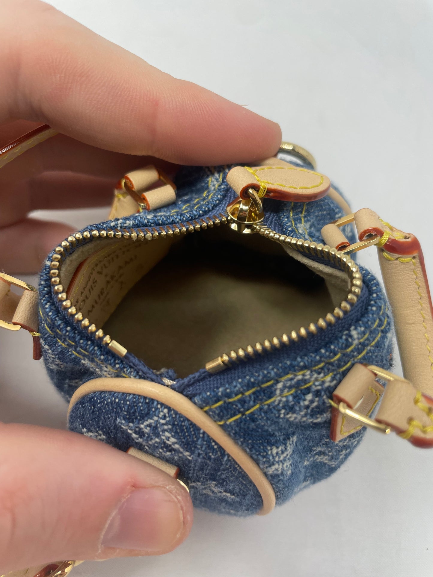 Louis Vuitton x TM Cherry Micro Speedy Bag Charm with Strap, original box, and duster