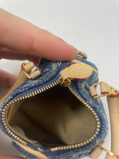 Louis Vuitton x TM Cherry Micro Speedy Bag Charm with Strap, original box, and duster