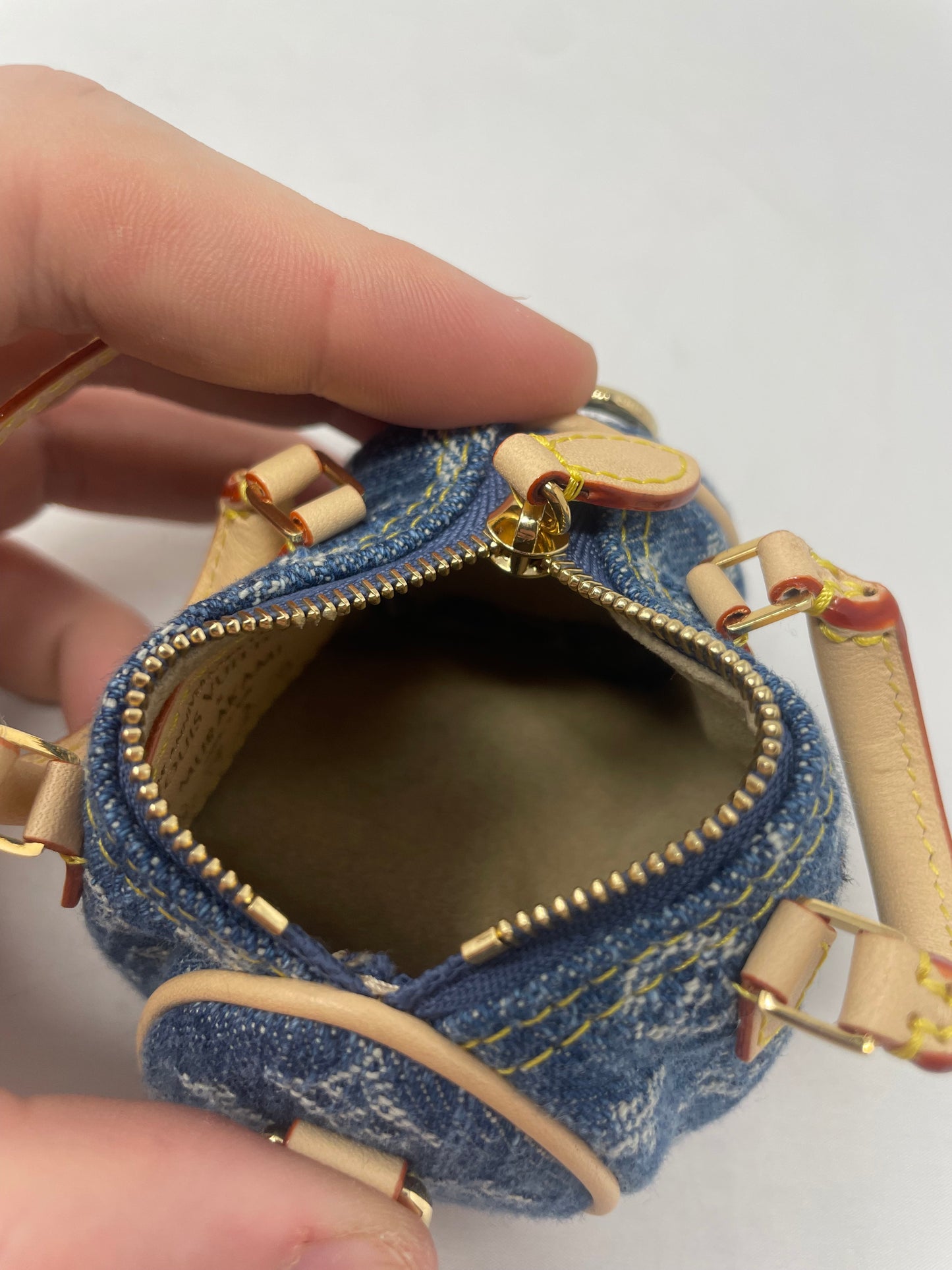 Louis Vuitton x TM Cherry Micro Speedy Bag Charm with Strap, original box, and duster